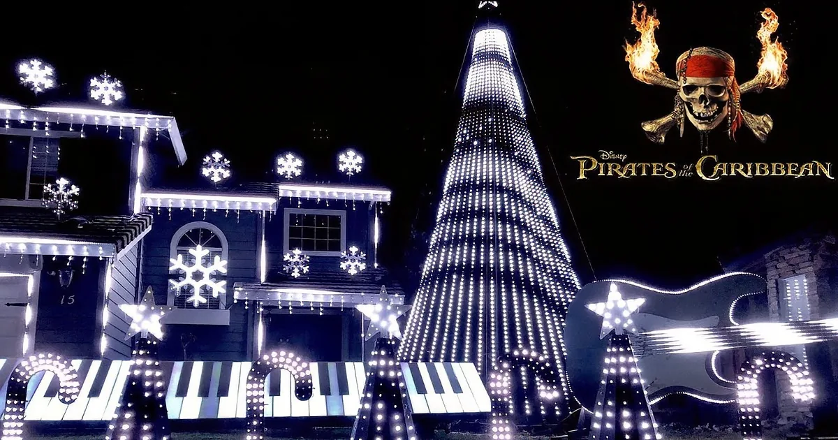 A house is decorated with pink lights, a Christmas tree, and musical instruments, creating a festive and vibrant display.