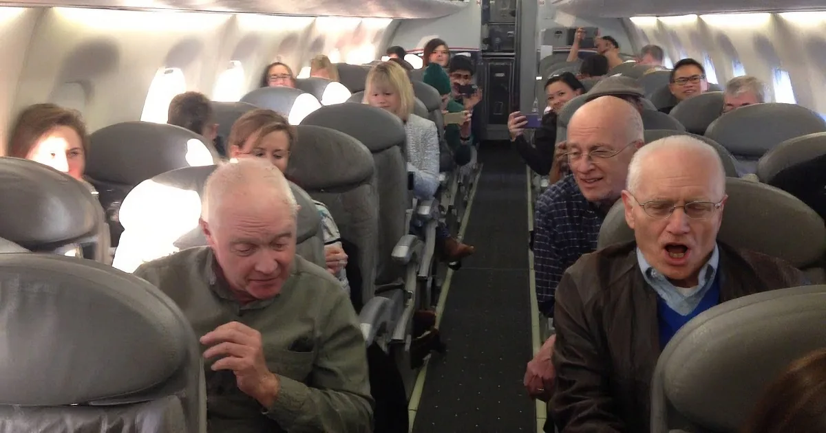 Every Passenger on a Plane Whips out Their Phones When These Elderly Men Do This.
