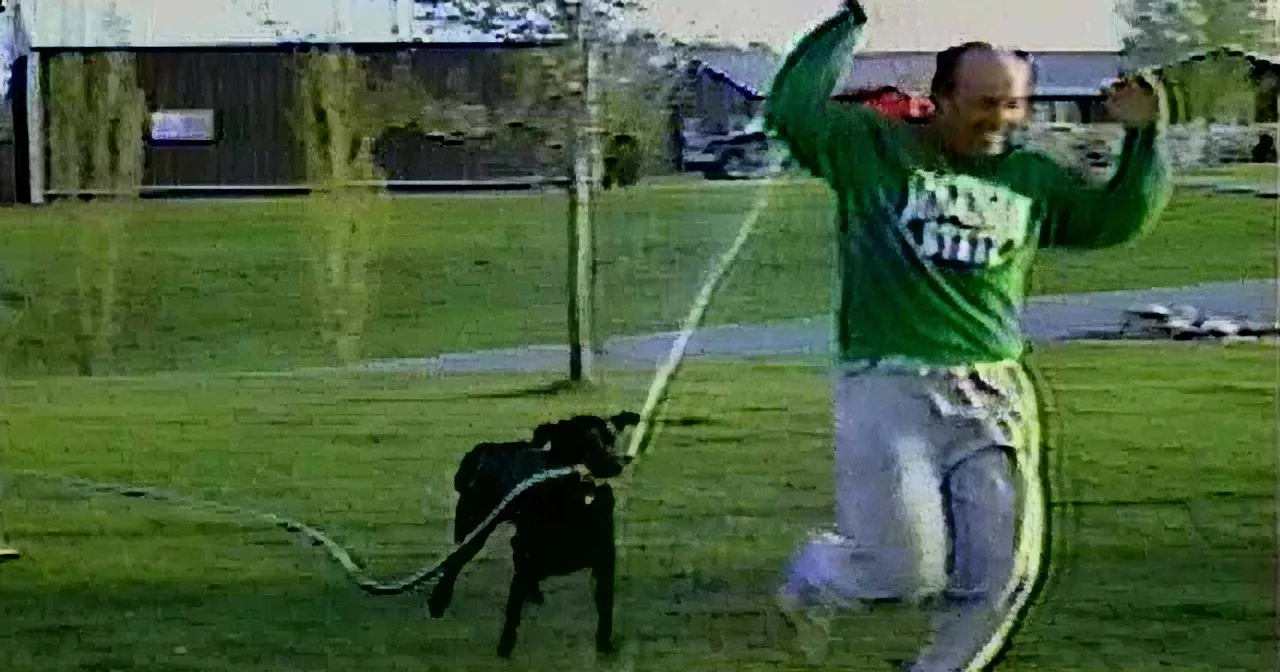 This Adorable Labrador One Ups His Master During Bath Time! Watch as He Steals the Hose!