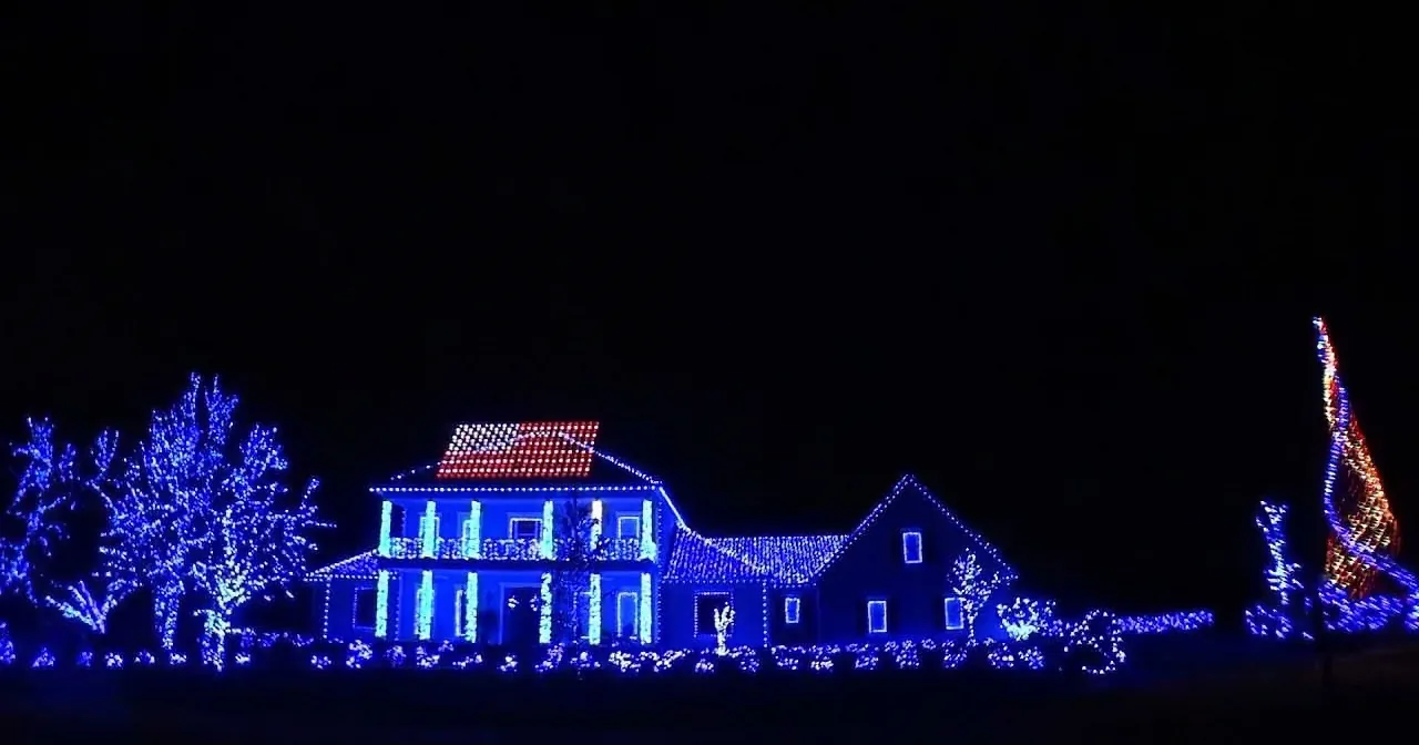 He Put Christmas Lights Around His House, and Keep an Eye on That American Flag