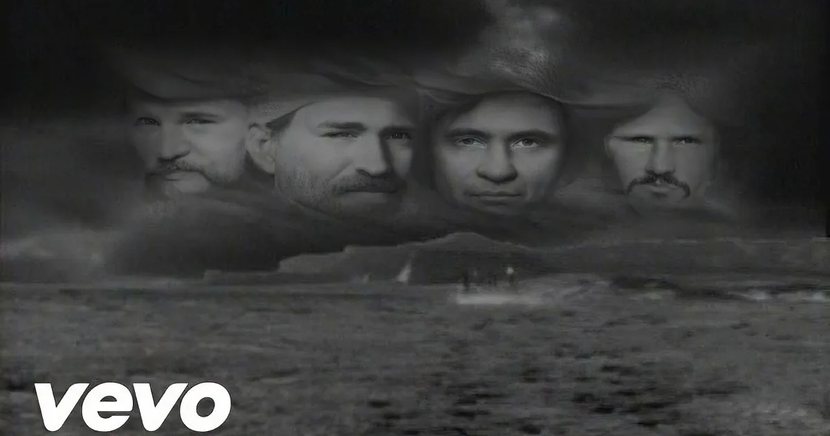 Four men with beards and hats are partially submerged in water, looking serious.