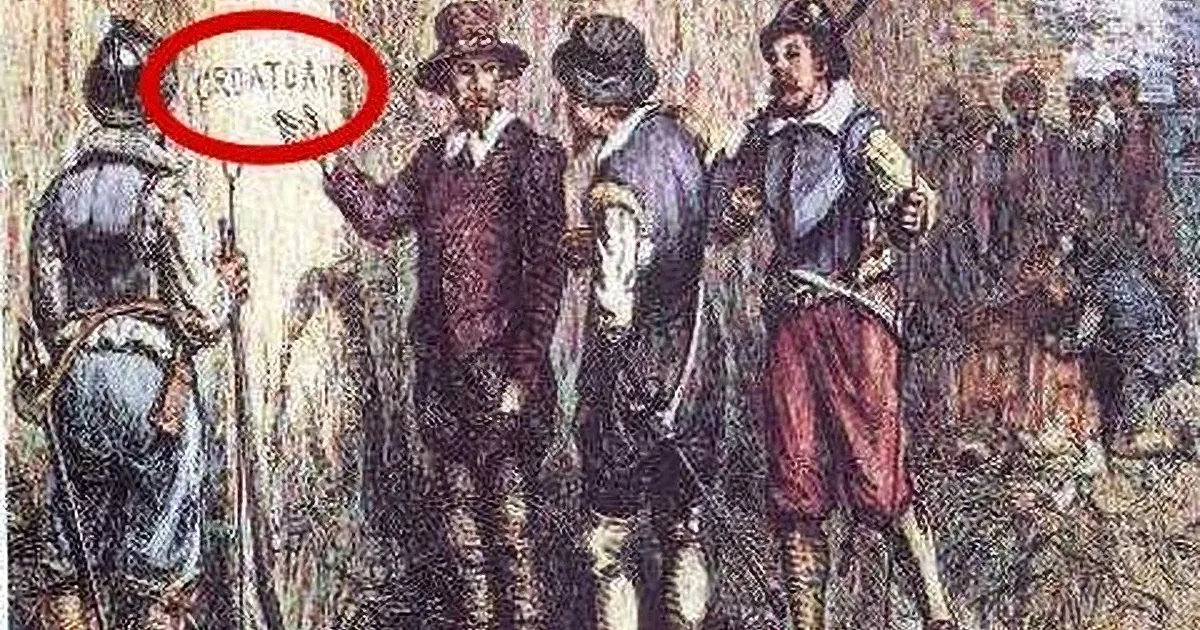 A man in a brown coat and hat is holding a sign with "CROATIAN" written on it, surrounded by other people in historical...