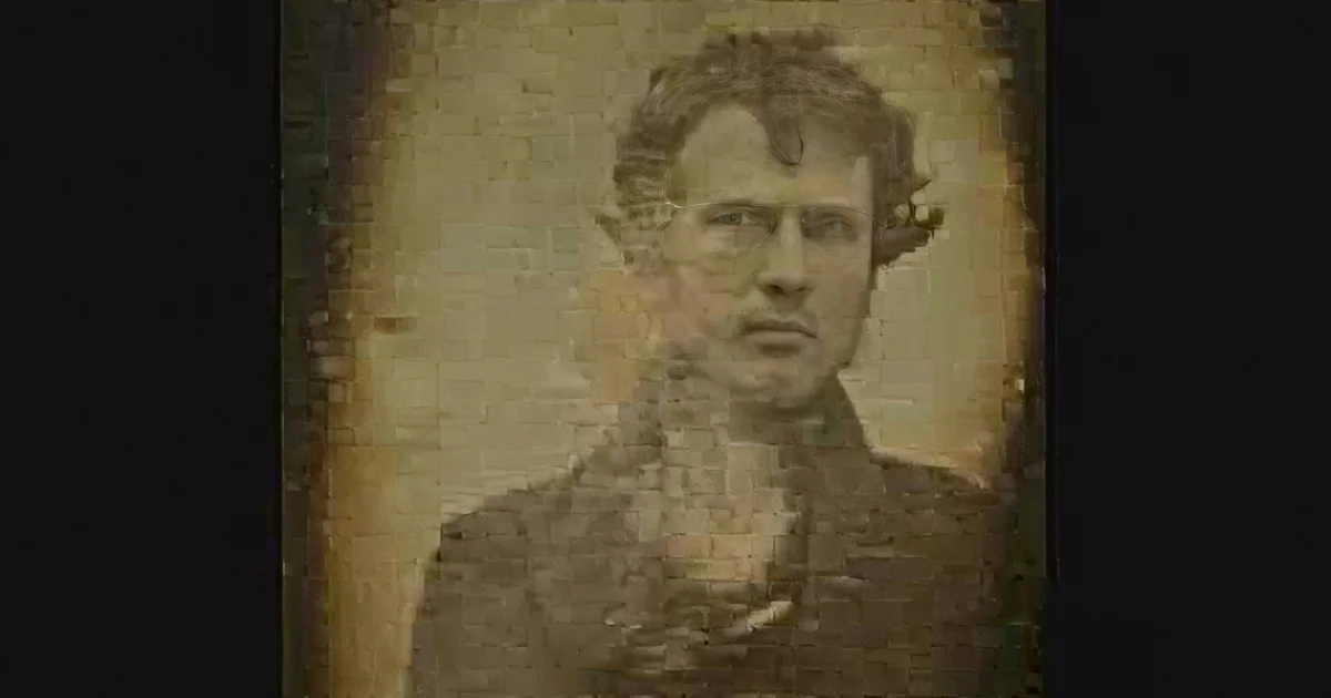 A sepia-toned portrait of a man with curly hair, wearing a dark jacket, against a faded background.
