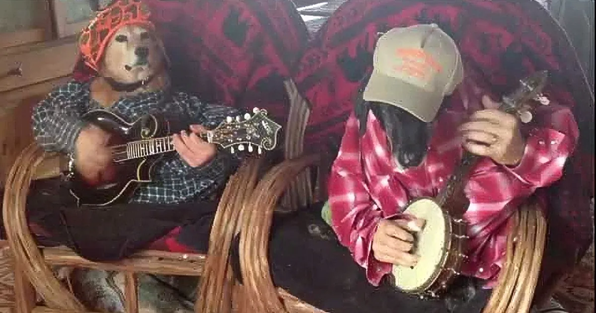 A person in a plaid shirt and cap plays a banjo, while another in a colorful outfit plays a mandolin.