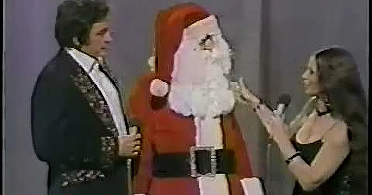 Santa Wishes Johnny Cash a Merry Christmas. but When He Takes off His Beard? so Funny!