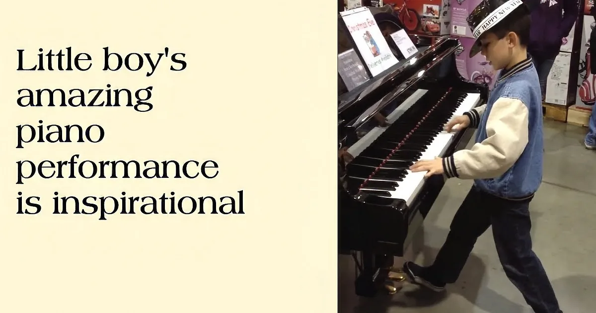 A young boy in a hat plays a piano in a store, surrounded by holiday decorations.