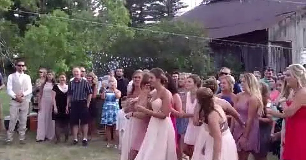 Bride Is Getting Ready to Throw Her Bouquet Into a Crowd. but There Was More Romance to Come