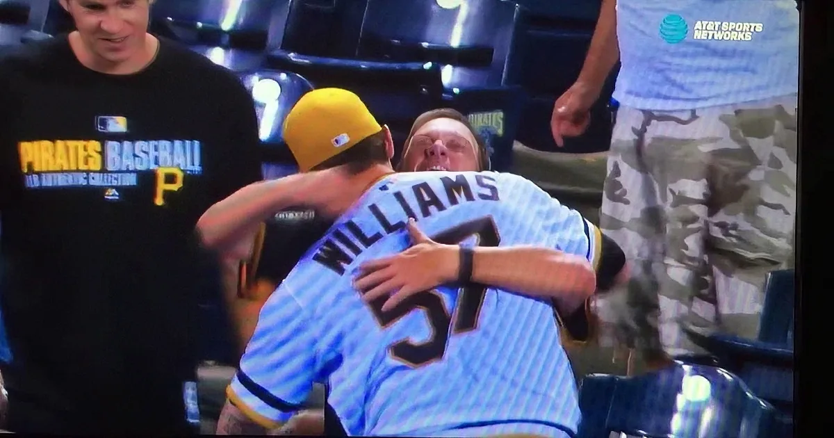 Rookie Pitcher Notches First Win in Major Leagues. Watch His Dad and Baby Afterwards.