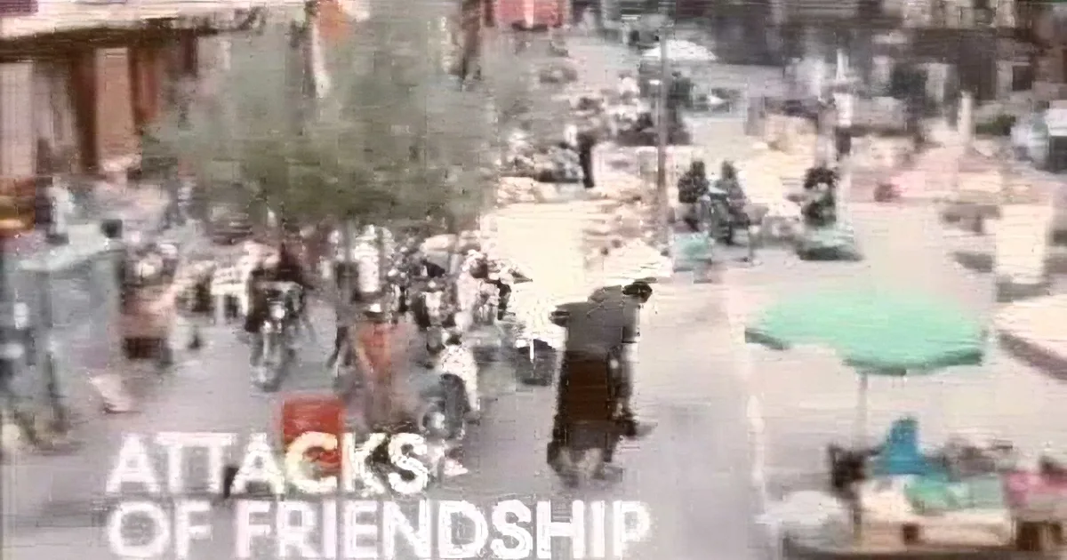 A group of people in a crowded area, some appearing to be in distress or conflict.