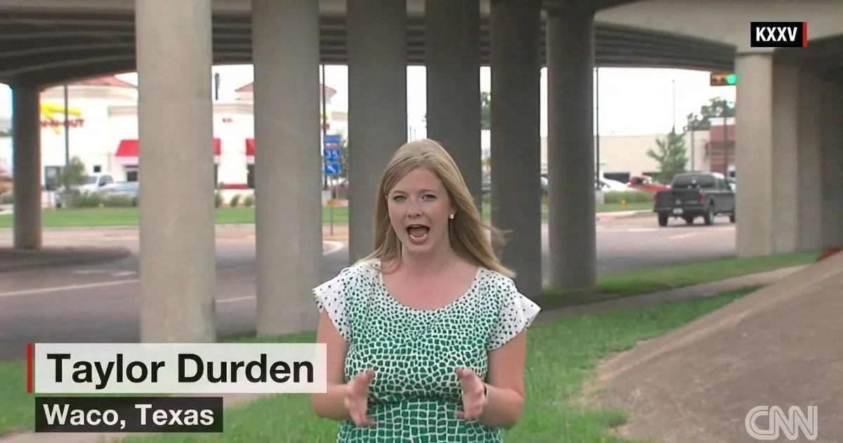 Taylor Durden, CNN reporter, stands under an overpass in Waco, Texas, gesturing while speaking.