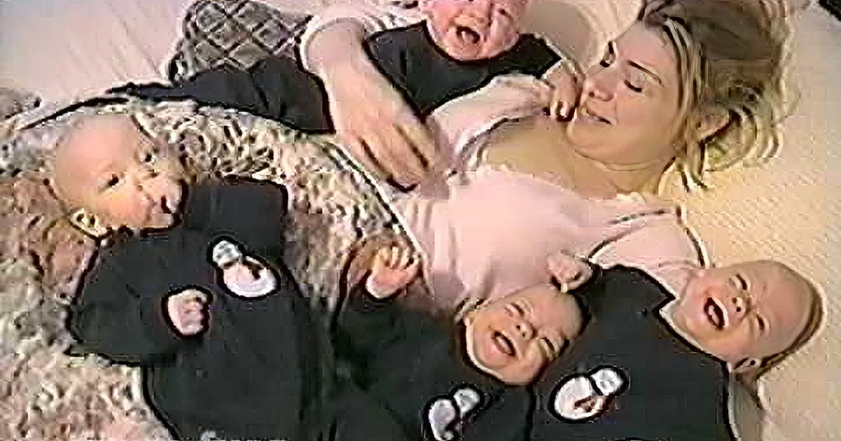 Mommy Lays With Her Quadruplets. I Always Smile When I See What Happens Next.