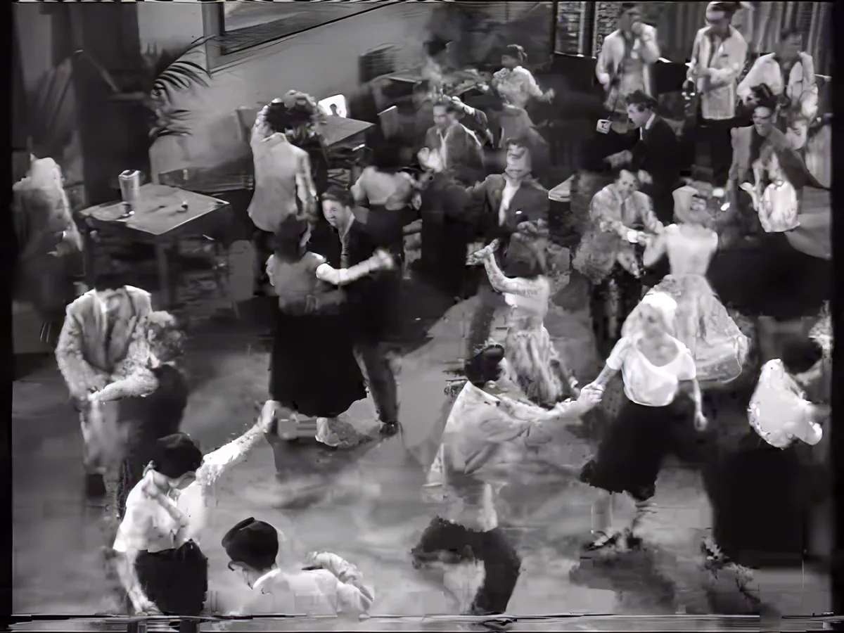 A lively dance scene with couples in mid-movement, dressed in vintage attire, in a social setting.