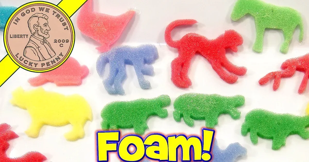 Colorful foam animal shapes scattered on a white surface, with a penny graphic and "Foam!" text.