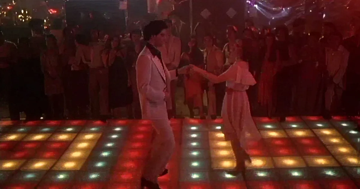 John Travolta Takes Stage With Dance Partner for Iconic Movie Scene. the Music Is Still Awesome.