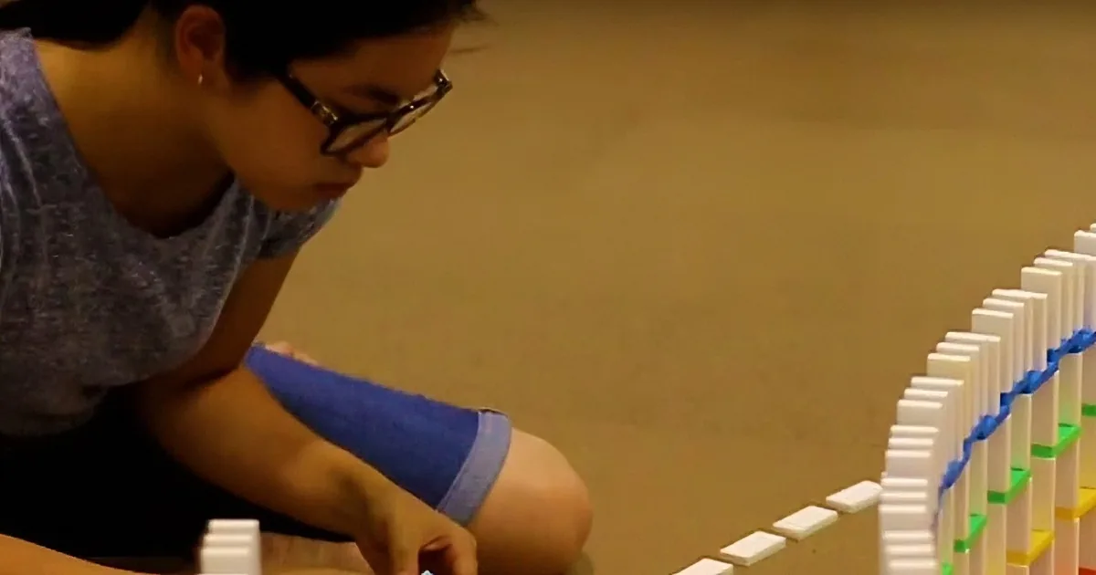 Get Hypnotized Watching 15,000 Dominoes Fall One-by-One in a Wild Triple-Spiral Pattern
