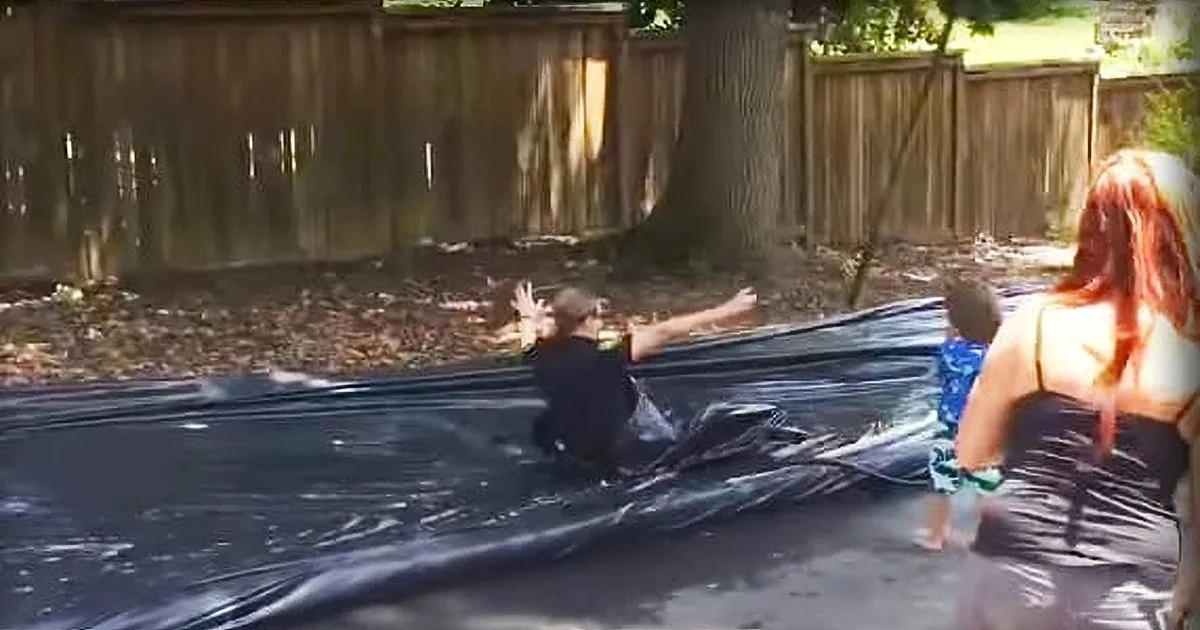Neighbor Calls 911 Over 'Illegal' Slip-N-Slide, but They Weren't Expecting Cops to Do This
