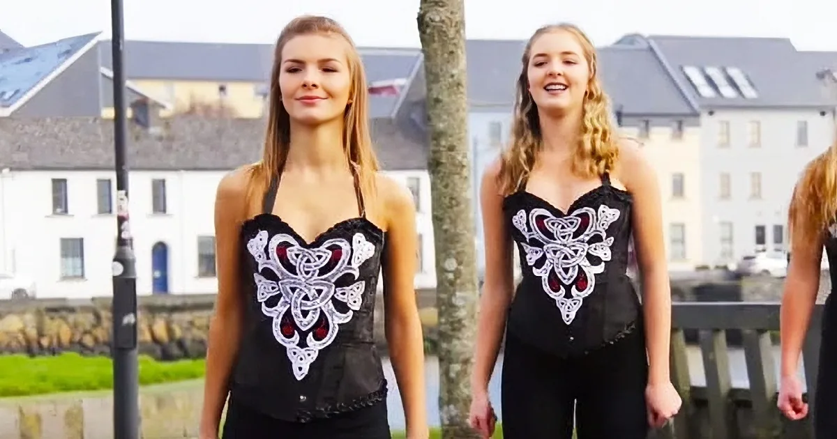8 Girls Form a Line on a Dock -- but Watch Closely as the Unexpected Suddenly Happens
