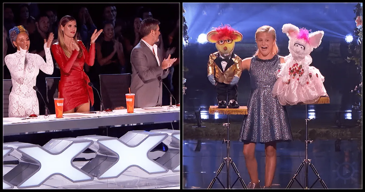 A woman in a sparkly dress holds a puppet on stage, while judges and audience members clap in the background.