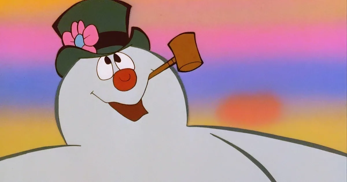 A cheerful snowman with a green hat and a red carrot nose is smiling and holding a wooden club.