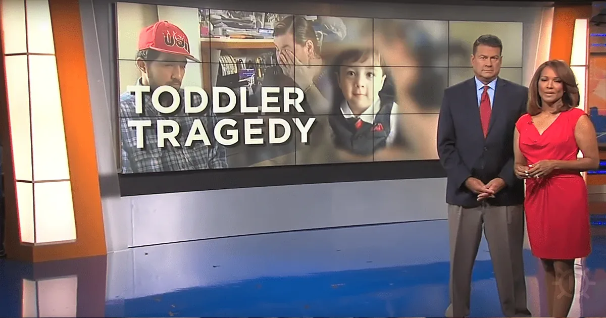 News anchors discuss "Toddler Tragedy" on a large screen behind them.