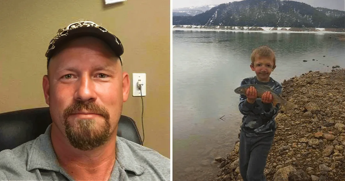 A man in a cap and a young boy holding a fish by a lake with snowy mountains in the background.