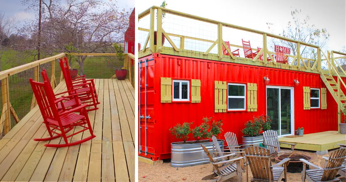 A vibrant red shipping container home with wooden deck, red rocking chairs, and outdoor seating area.