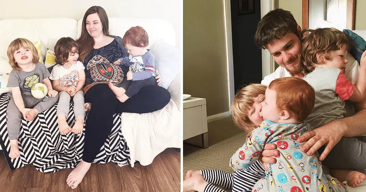 A family of five, including two adults and three children, are sitting together on a couch and floor, enjoying a cozy moment.