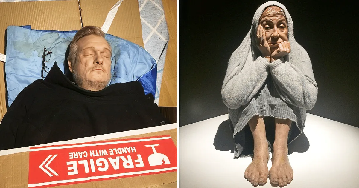 A man lies in a cardboard box with a "Fragile" sticker, while another person sits wrapped in a blanket, appearing distressed.