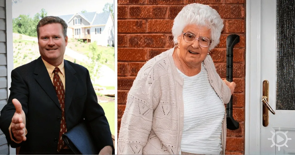 A man in a suit and tie is shaking hands with an elderly woman in a white sweater and glasses.