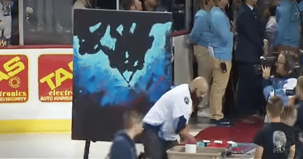 He Starts Singing the National Anthem, but Check out What He''s Doing With That Canvas.