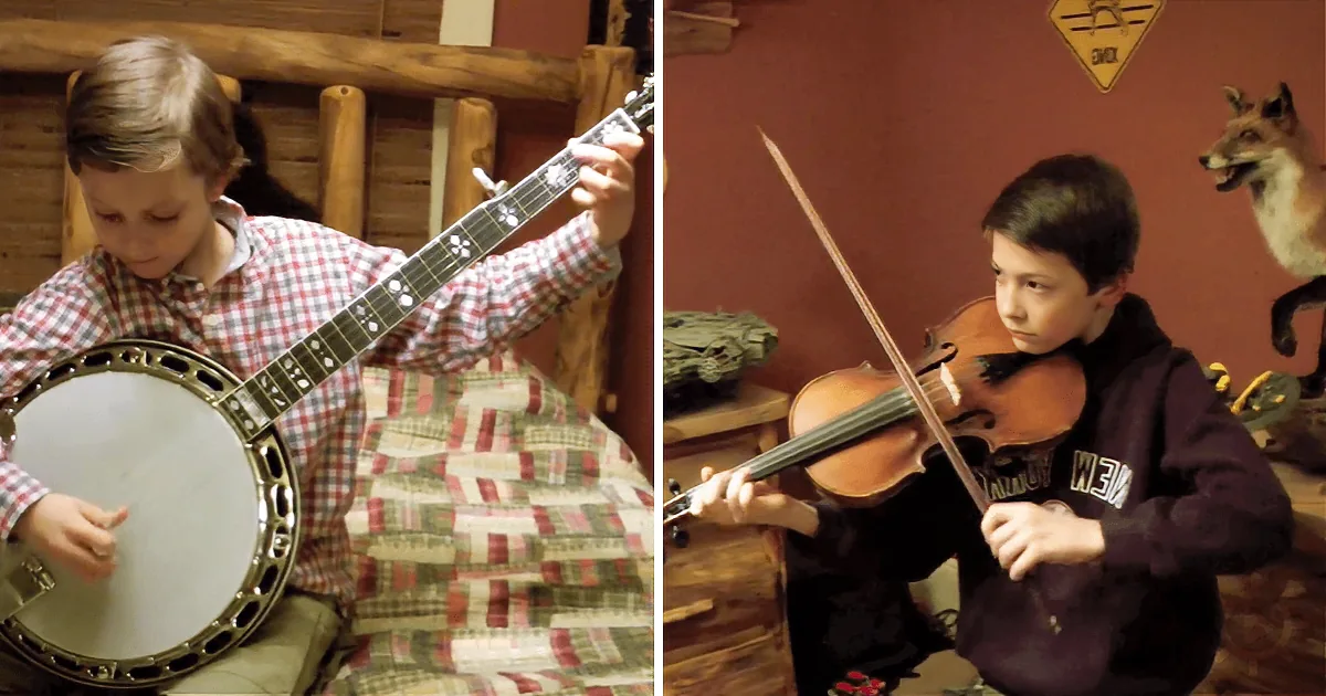 A boy in a plaid shirt plays a banjo, while another boy in a hoodie plays a violin in a cozy room.