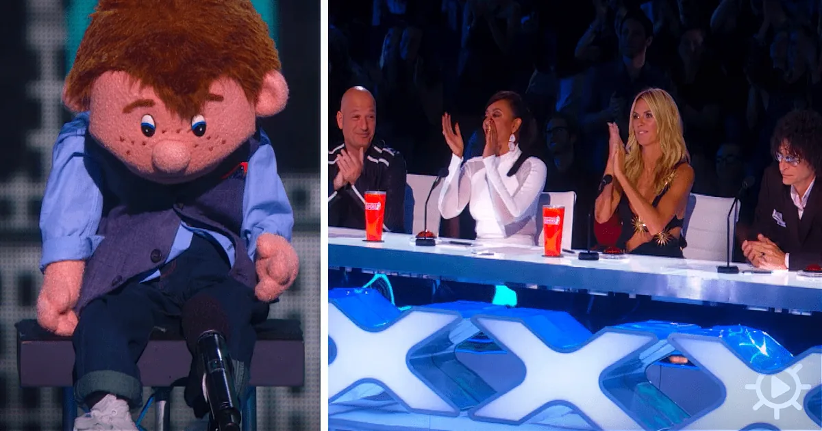 A plush character with a prosthetic leg sits on a stage, while judges clap on a panel with a "XX Factor" logo.