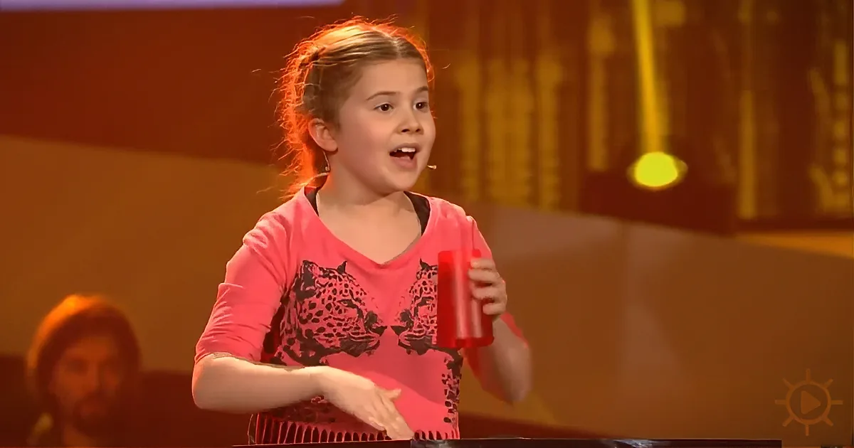 8 Year-Old Girl Wows the Voice Judges: Singing and Playing a... Plastic Cup?