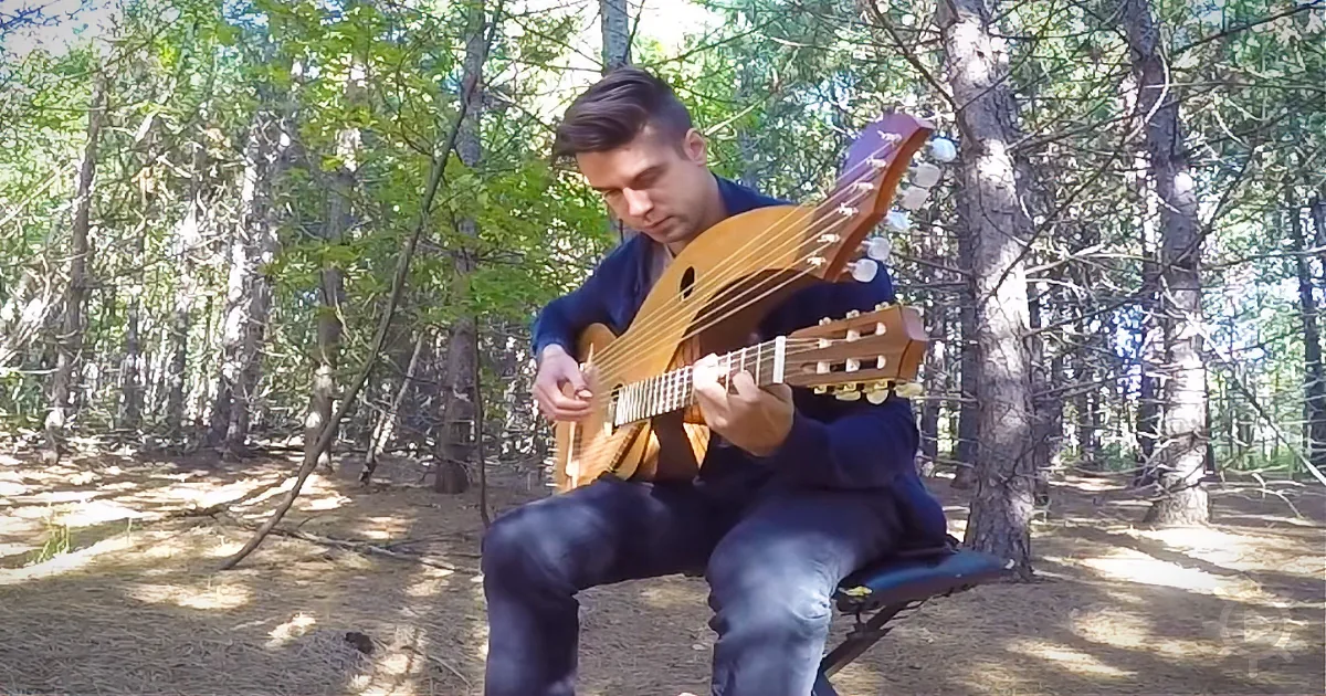 Man Playing ''The Sound of Silence'' on an 18-String Harp Guitar Is Too Beautiful for Words