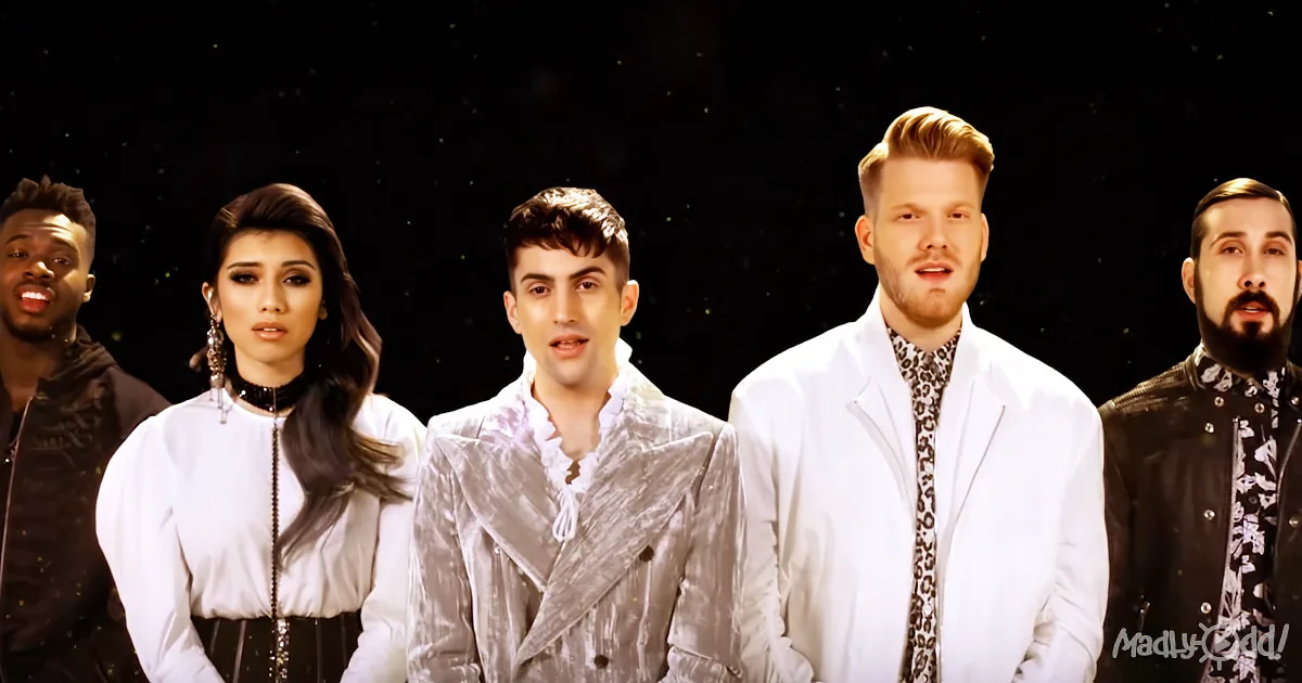A group of five individuals stands together, dressed in stylish attire, against a dark, starry background.