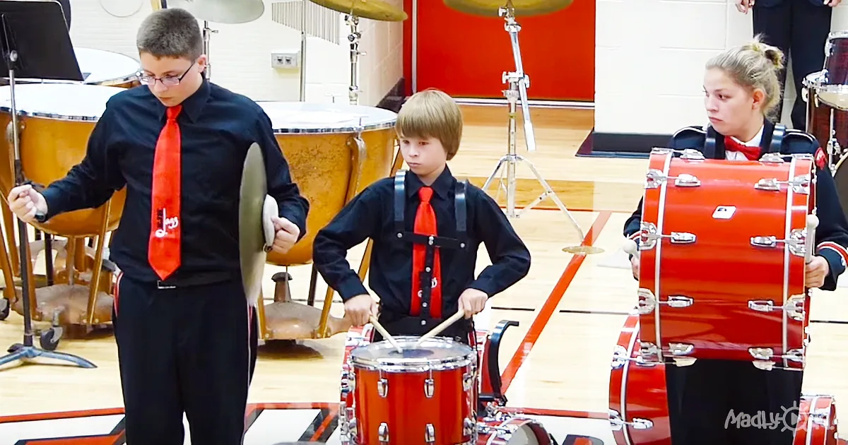 The Show Must Go on: Kid Drops Instrument During National Anthem, Thinks Fast