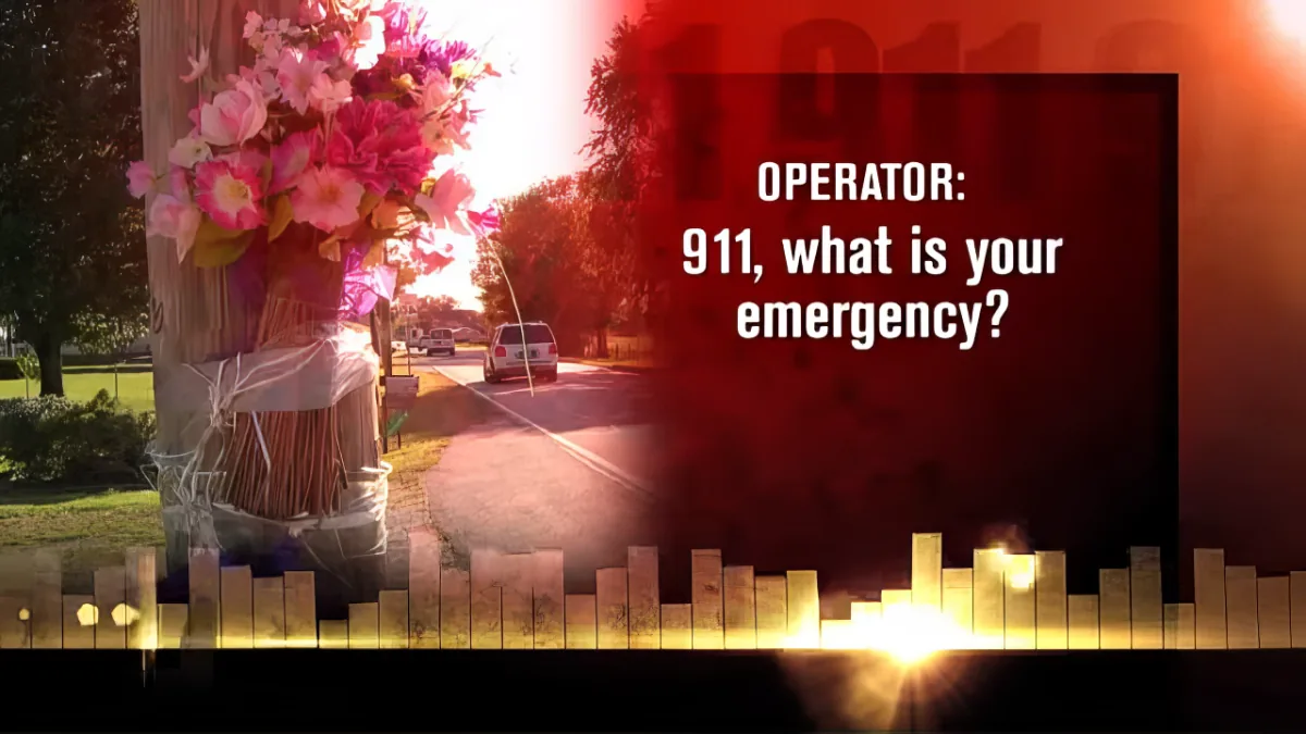 A bouquet of flowers wrapped around a tree with a 911 emergency call text overlay.