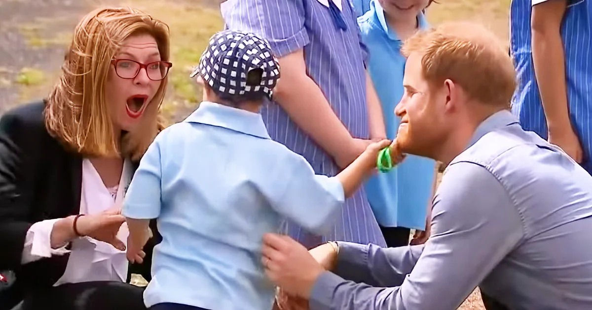 A young boy in a checkered hat is playfully interacting with a man in a light blue shirt, while a woman in glasses looks...