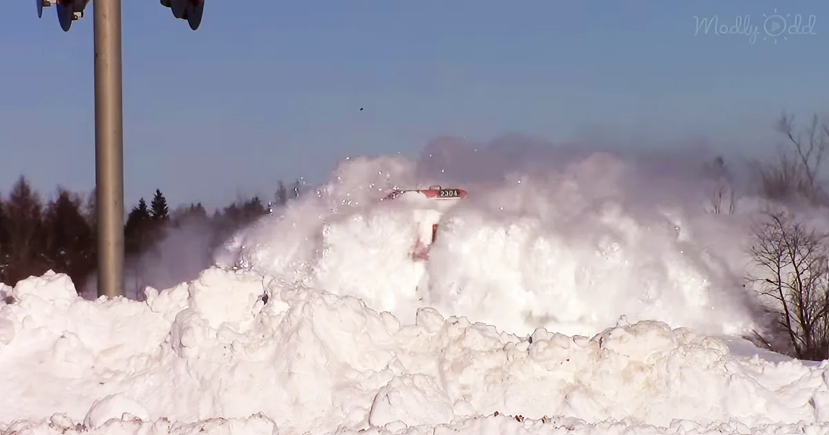 Speeding Train Slams Into Huge Wall of Snow as Man Captures Everything on Camera