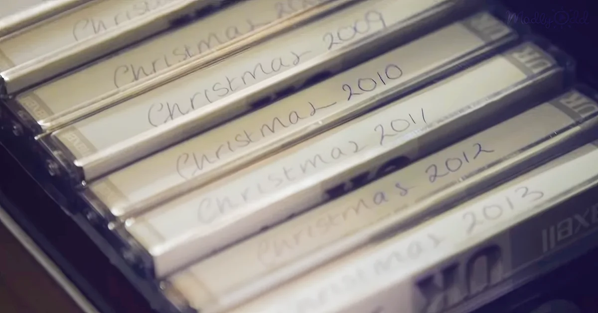 Stacked VHS tapes labeled "Christmas 2009-2013" are neatly arranged.