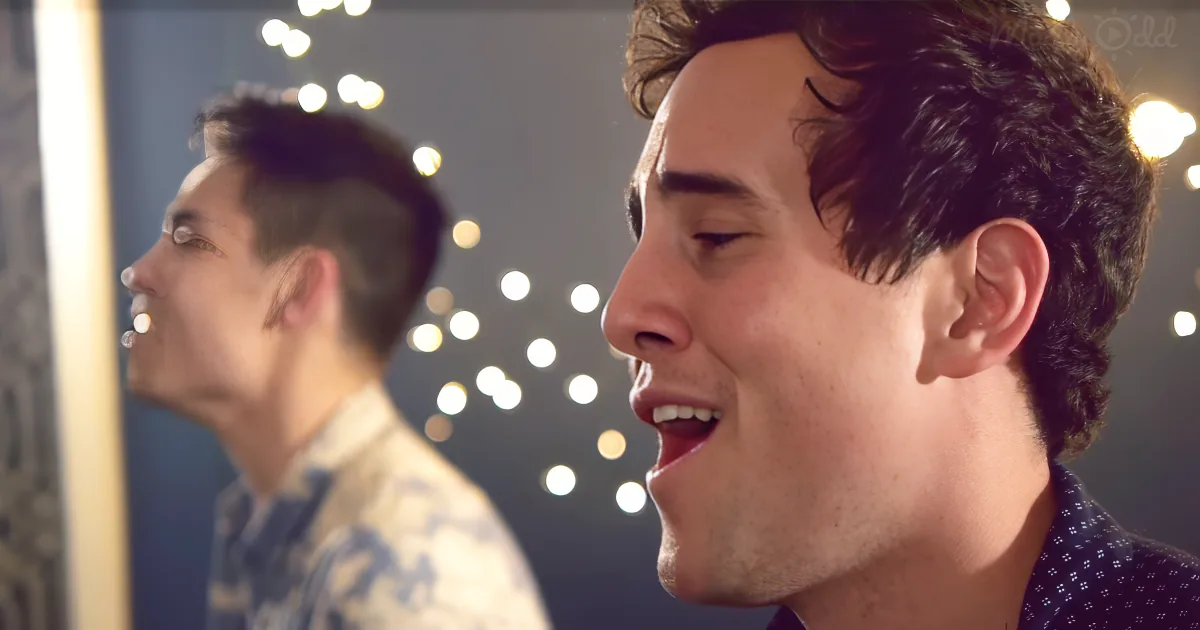 2 men sing different songs at the same time