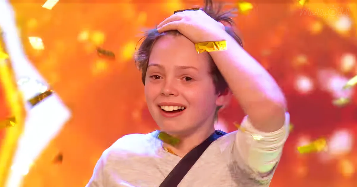 A boy with a hand on his head, smiling, surrounded by golden confetti and a vibrant orange background.