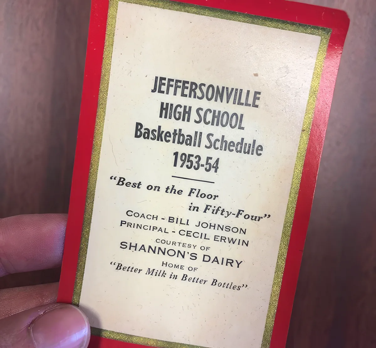 A vintage Jeffersonville High School basketball ticket stub with details about the game and sponsors.