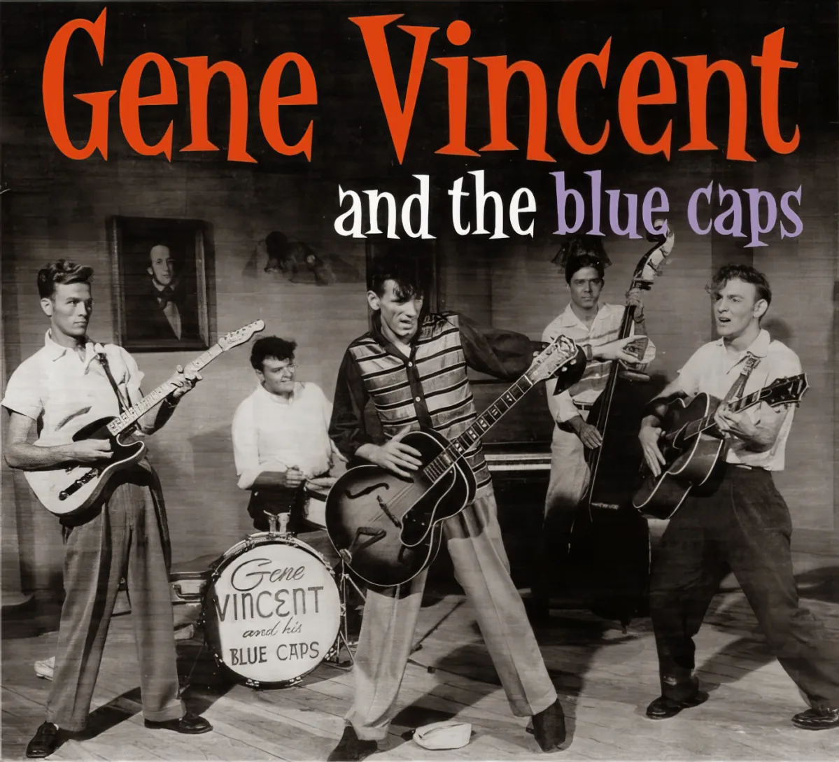 Gene Vincent and the Blue Caps perform with guitars and drums, showcasing their music.