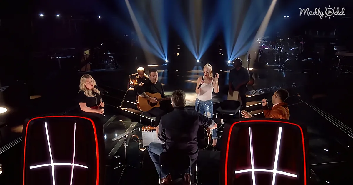 A woman sings on stage with a band, while judges sit in red chairs with glowing crosses.