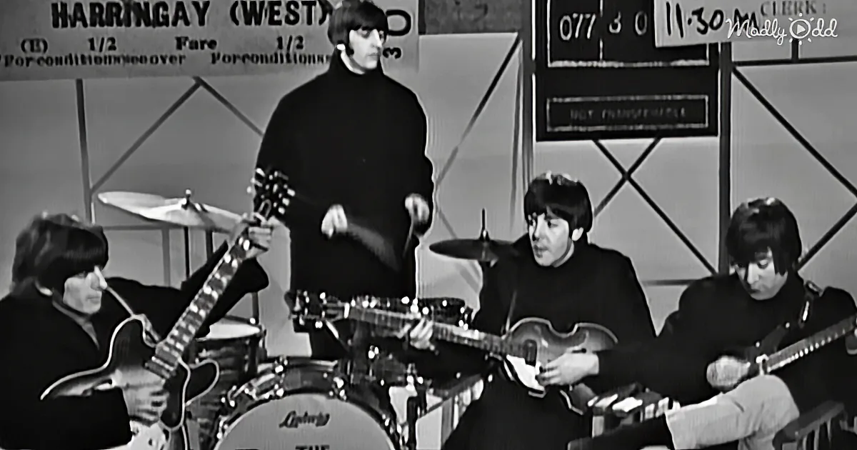 The Beatles perform live, with John Lennon playing guitar, Paul McCartney on bass, Ringo Starr on drums, and George...