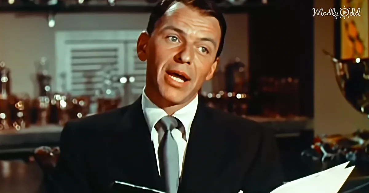 Frank Sinatra in a suit, holding sheet music, with a cityscape and trophies in the background.
