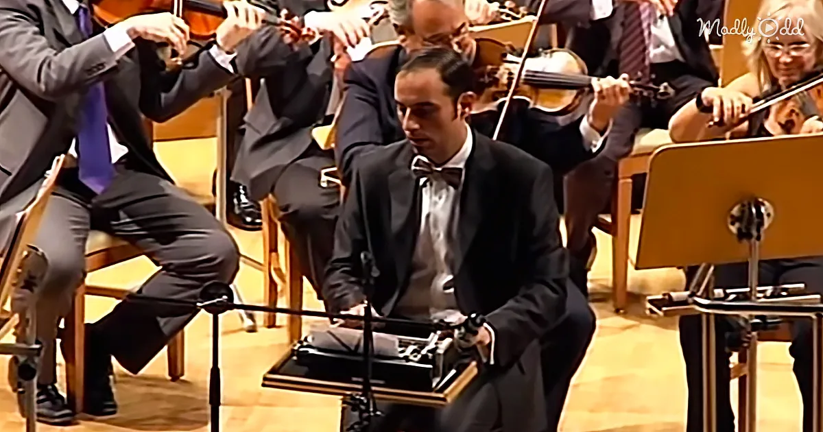 Hilarious Orchestra Performance Features Man Playing a Typewriter