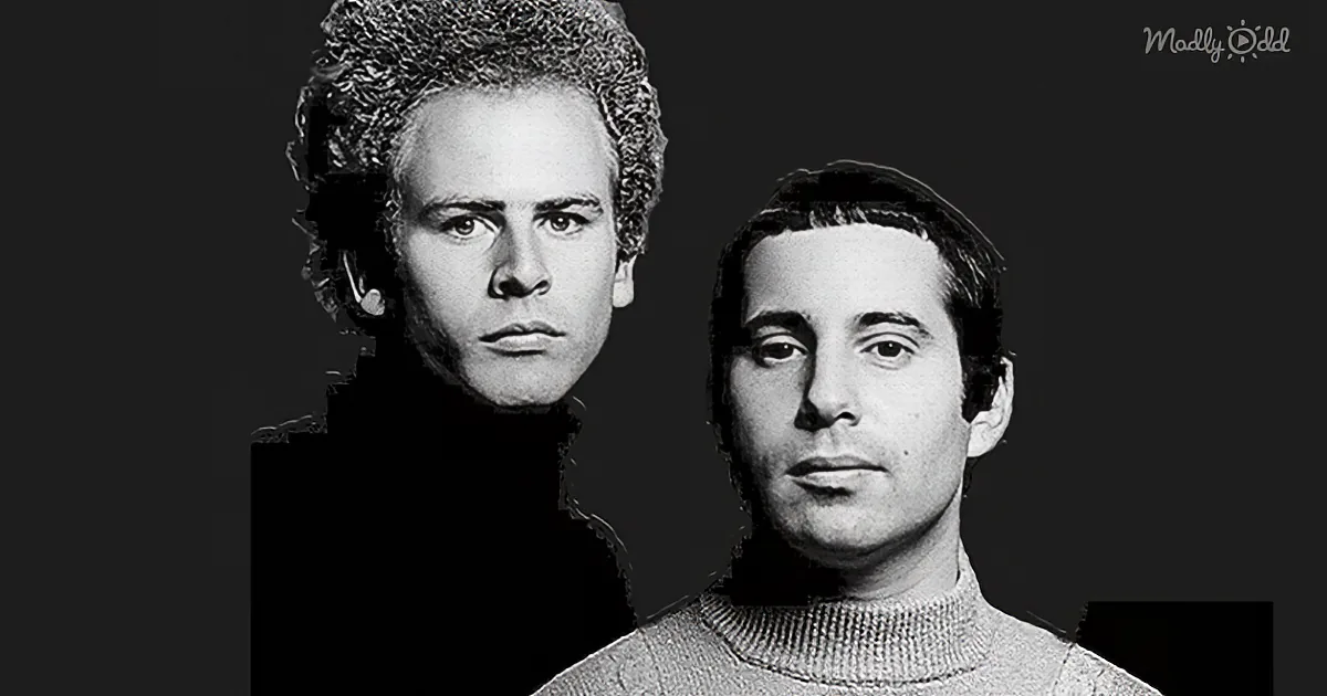 Two men in turtlenecks, one with curly hair, both facing forward, against a dark background.