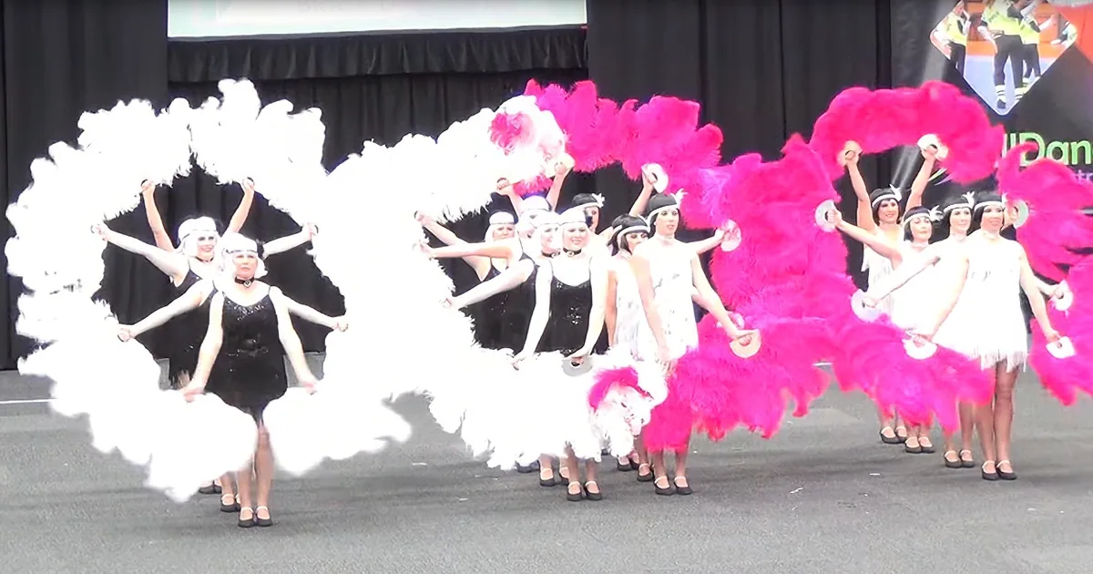 20''s Flappers Decked out in Feathers and Pearls Stun the Crowd With a Killer Swing Routine